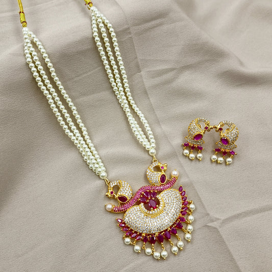 Lavishing Peacock Designer Tanmani Set