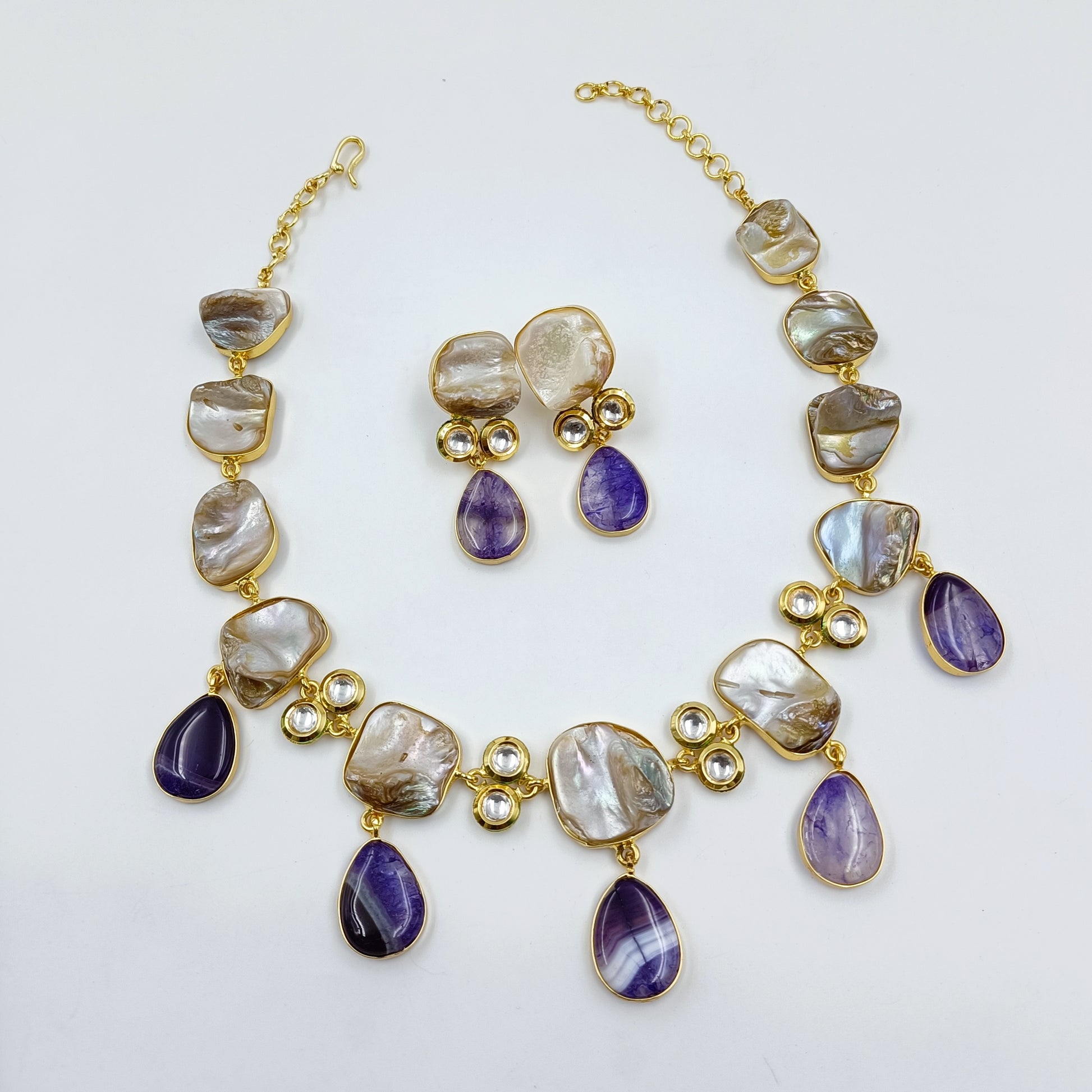 Purple Color Stone Studded Mother Of Pearls Set