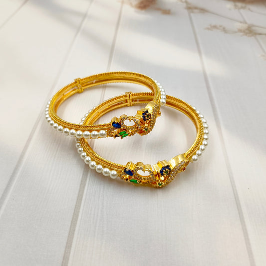 Gleaming Peacock Designer Pearls Bangles