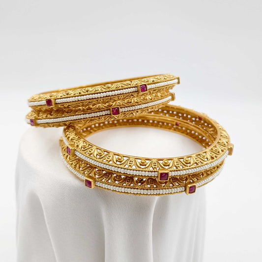 Sparkling Pearls Studded Fancy Bangles